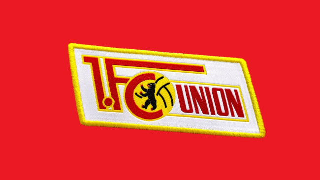 Le directeur du football de l'Union Berlin défend l'entraîneur Marie-Louise Eta contre les commentaires sexistes suite à sa nomination historique.