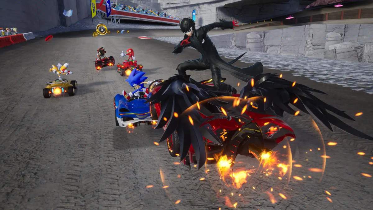 Séquence de gameplay de Sonic Racing: CrossWorlds montrant Sonic et d'autres personnages issus de crossovers lors d'une course de voitures.